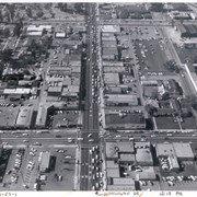 Aerial view from above Huntington Drive between Santa Anita Avenue and First Avenue.  Huntington Drive intersects the photo from north to south.  The street closest to the bottom is First Avenue and Santa Anita Avenue is near the top.