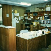 View inside Arcadia Public Library, 20 W. Duarte Road shortly before the start of construction for the 1995/96 expansion/remodel project.  This photo is of the back section of the old technical services area, with the open door leading into the Technical Services Supervisor's office.