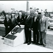Photo of dignitaries at the dedication of plaque marking site of Ross Field. Man on extreme right is ex-Congressman John Hoeppel who was most responsible for securing land for Los Angeles County Park. Others in photo not identified.