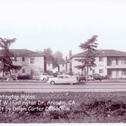 Huntington House apartment buildings at 891 West Huntington Drive, Arcadia, CA. Built by Dolph Carter Dodds. 1950s cars parked in front of apartments.