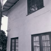 Exterior of Prince Erik Hall showing windows and corner design. Former home of Prince Erik of Denmark in 1920s at 2607 S. Santa Anita Avenue. Property now owned by Arcadia Congregational Church. Photograph by Terry Miller. See also ID 2178.
Note: Per Jolene Cadenbach, a fire destroyed Prince Erik Hall in June 2021, tear down started around end of 2021, and was completely torn down in 2022.
