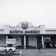 Another exterior view of 99 Ranch Market, a Chinese market at Duarte Road and Golden West Avenue, showing shoppers going in and out of entrance. Address is 1300 South Golden West Avenue in Arcadia. Photograph by Terry Miller.