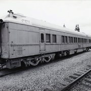 Side view of abandoned caboose of a train. Train is marked with Pine Bluff SP 151 (clearer in photo 2258A). Located on train tracks near First Avenue, between Santa Clara Street and Saint Joseph Street in Arcadia, California. Photo by Terry Miller.