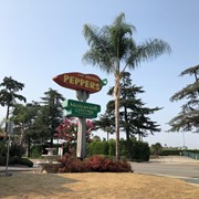 View looking southwest at the sign and fountain in front of The Original Peppers Mexican Grill & Cantina located at 181 Colorado Place in Arcadia. It opened in the 1960s on Route 66 across the street from Santa Anita Park and closed permanently in 2021.