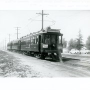 Engine #10 and two cars outbound as the Santa Anita Special to the Race Track.  This is on Huntington Drive near Baldwin Avenue. This photo belongs to Southern California Edison Historical Collection. It is shown here for research only.