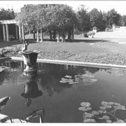 View across decorative pond toward main entrance of Anoakia.