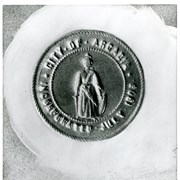 Portion of earliest seal of the City of Arcadia showing only one figure with sword in one hand and shield in another.  It reads: CITY OF ARCADIA. INCORPORATED JULY 1903.