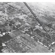 Aerial view toward NE.  Plane is over property of Charles W. Stewart (10 acres), and Jaspar Teague (10 acres), at 1320 S. Santa Anita Avenue, which is directly under the plane.  Next street east is First Avenue, then Second Avenue, the Fourth Avenue.  Reservoir is at corner of Valnett Avenue and Second Avenue and was owned by Walnut Grove Mutual Water Company  (Valnett Avenue was first through street south of Duarte Road at this time and became Camino Real).