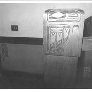 Detail of newell post with Maynard Dixon Alaskan Indian motif, and other Indian designs painted on wall.  This is at bottom of stairs leading to Jinks Room at Anoakia.