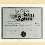 Photo of first diploma issued by Arcadia school.  It was made out to first graduate, Ellison Leake and signed by George Ethel Wayne, Principal.