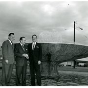 View NW toward fountain in NE corner of Arcadia County Park at the time of dedication of the fountain.  Supervisor Frank G. Bonelli is seen activating spray for first time.  On left is Norman Johnson, Director of Parks and Recreation Dept.  Man on right is Arcadia City Manager Harold K. Shone.