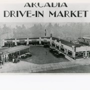 View south, perhaps from top of City Hall on Corner of First and Huntington Drive, to Arcadia Drive-In Market.  Located on SW corner of the same intersection there was, in addition to the Service Station, a dry cleaners, a bakery, a fresh vegetable market, a meat market, a grocery store, and the Pines Cafe.  First Avenue is street seen on the left.