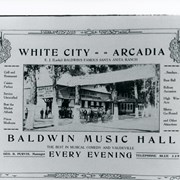 Photo ad for White City-Arcadia.  Sign on wall calls it a resort.  Photo shows lady and child in light carriage with fourteen people standing nearby. Beneath photo it reads: BALDWIN MUSIC HALL-THE BEST MUSICAL COMEDY AND VAUDEVILLE-EVERY EVENING. Banner between trees reads BIG BARBEQUE ----(not clear) BAND AND ORCHESTRA ----(not clear). (Barbecue?)