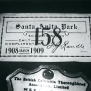Photo of complimentary day pass to 1908-1909 season at Baldwin's Santa Anita Race Track signed by F.G. Randle, secretary and treasurer of Los Angeles Racing Association.
