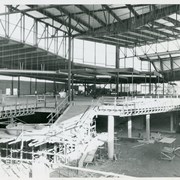 Interior view looking south from north walkway (second level) of Santa Anita Fashion Park during construction.