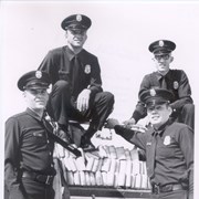 New firemen photographed.  In back are L-R: Don Little and Dick Pecjak. Front are, Monte Osborn and Gary Hawthorne.